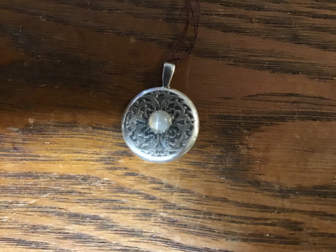 Pendent: Sterling with banded Moon stone.