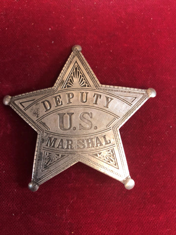 Badge: Sterling plated Deputy U. S. Marshal