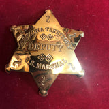 Badge: Solid brass Arizona Territory Deputy U. S. Marshal