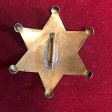 Badge: Solid brass Arizona Territory Deputy U. S. Marshal