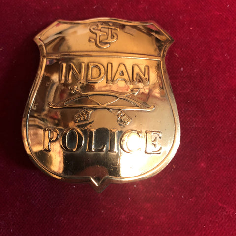 Badge: Solid brass shield U. S. Indian Police