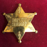 Badge: Solid brass Deputy Sheriff
