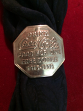 Scarf Slide: Brass Coca-Cola token from 1915